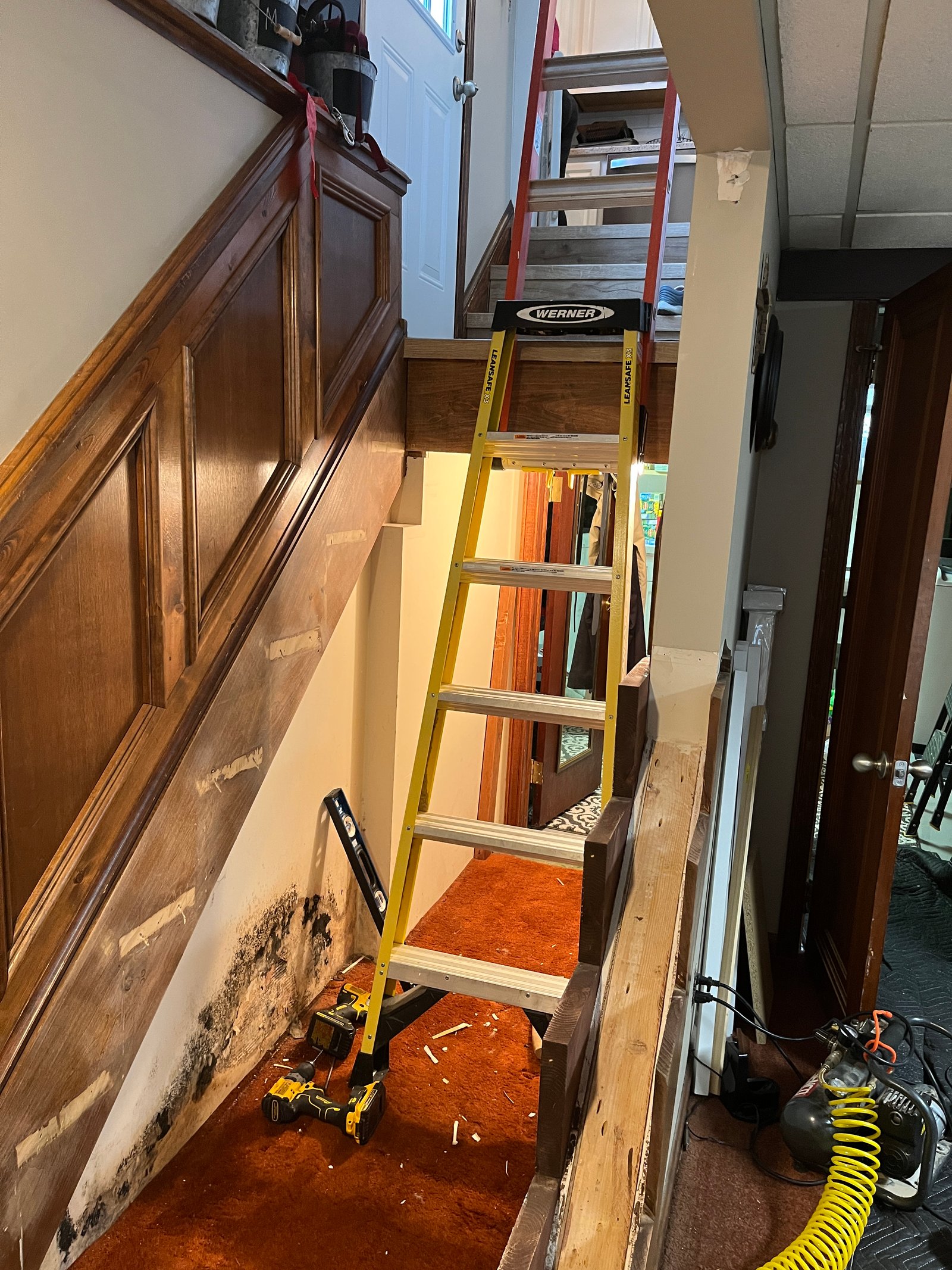 Stairwell demo with water damage