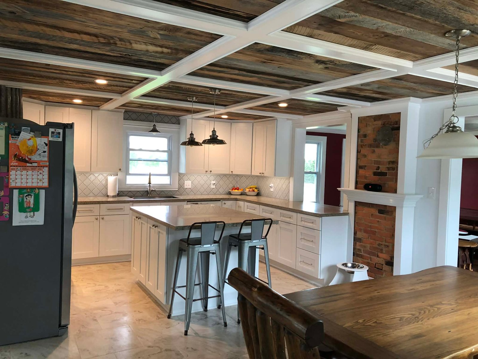 Kitchen remodel featuring a white coffered ceiling with reclaimed wood insets